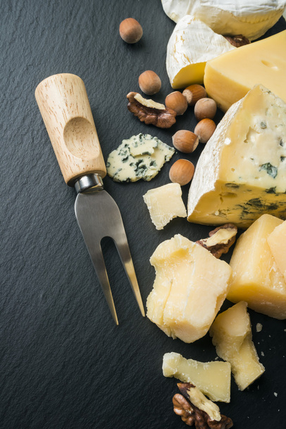 Different varieties of cheese and nuts - 写真・画像