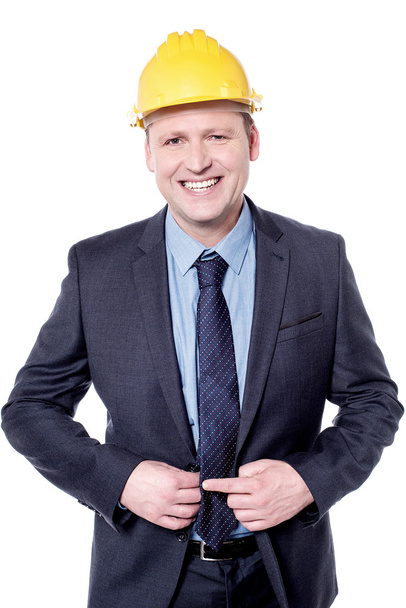 male engineer buttoning his jacket - Photo, image