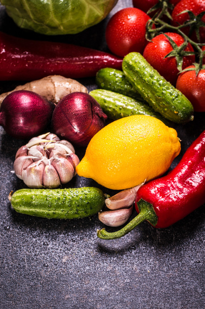 Assortment of fresh vegetables close up on black table - Zdjęcie, obraz