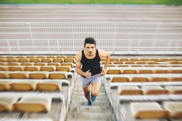 Running man on stairs - Foto, Imagem