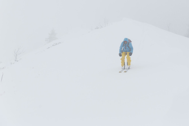 Skiing in the fog - Photo, image