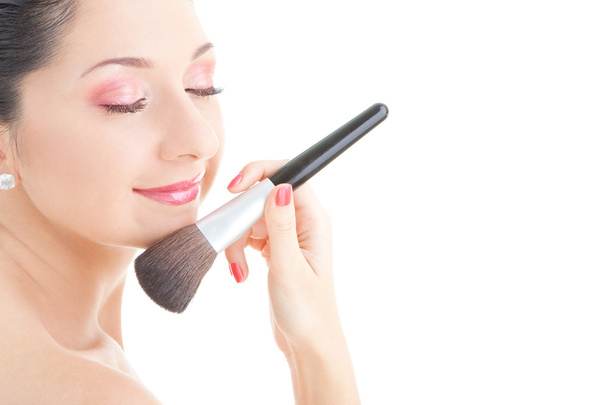 Young woman with brush for makeup - Foto, Imagen