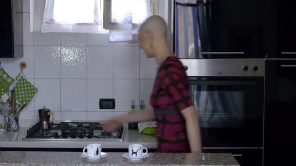 woman cancer survivor prepares coffee at home: relax, life, faith, vitality - Felvétel, videó