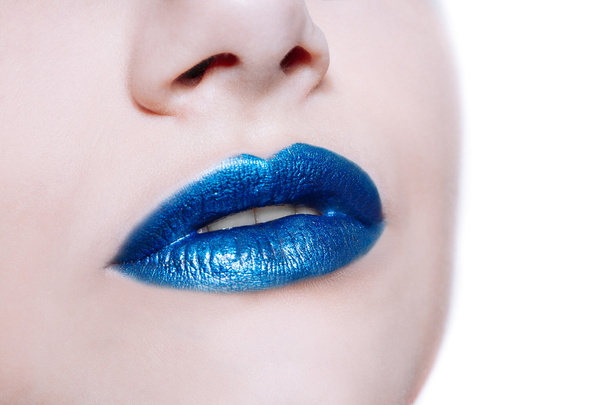 Woman lips with glossy blue lipstick - Foto, Bild