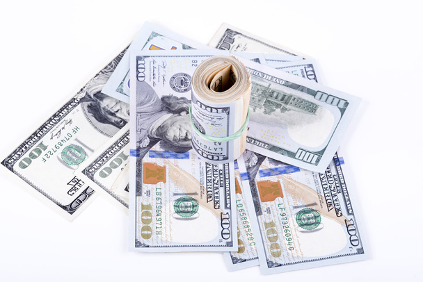 dollar biljetten op een witte achtergrond - Foto, afbeelding