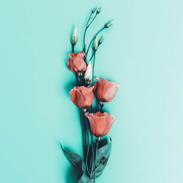 Romantic flowers on blue background. minimal style - Fotó, kép