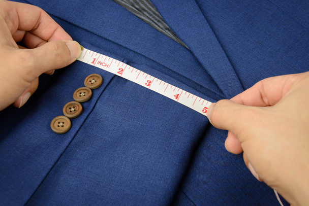 měření páska na modrý oblek - Fotografie, Obrázek