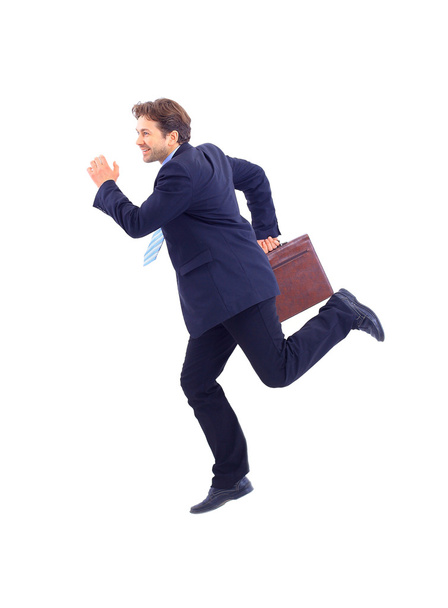 Young business man running isolated on white background - 写真・画像