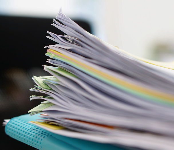 Pile of documents and blue file in office - Photo, Image