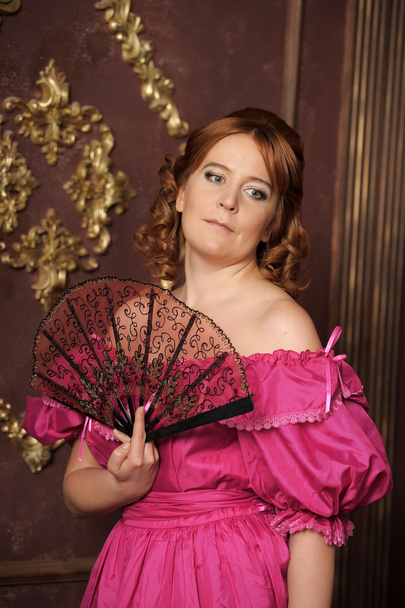 Woman with fan in medieval dress - Photo, image