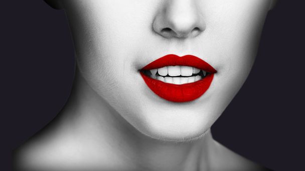 Sexy vampire woman with red lips. - Photo, Image