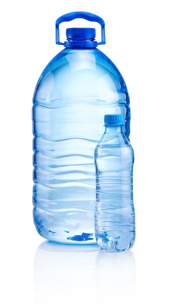 Plastic bottles of drink water isolated on white background - Valokuva, kuva