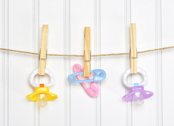 Baby Pacifier Binky Pink on a Clothesline - Photo, Image