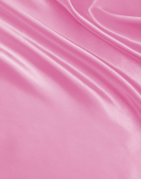 Smooth elegant pink silk or satin texture as background - 写真・画像