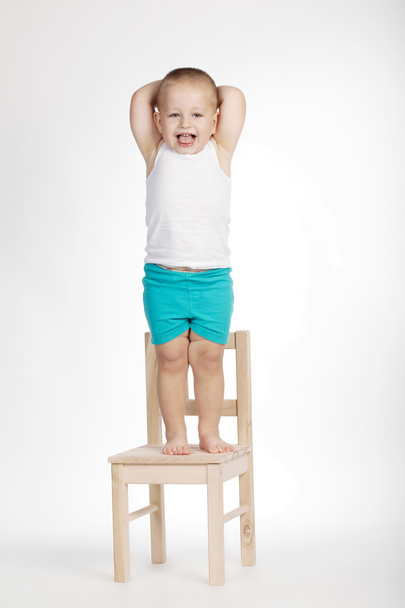 little funny boy on chair - 写真・画像