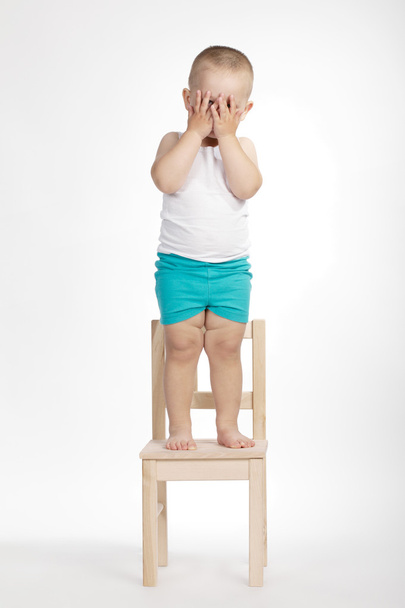 little funny boy on chair - 写真・画像