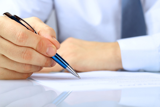 Businessman is signing a contract, business contract details - Photo, Image