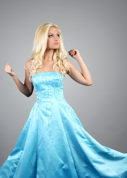 Beautiful woman wearing blue dress - Zdjęcie, obraz