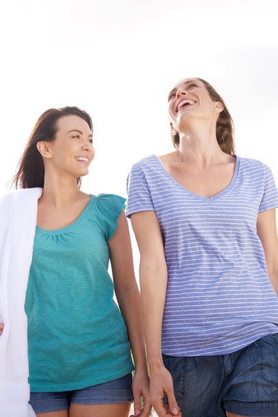 Two friends laughing outdoors - Photo, Image