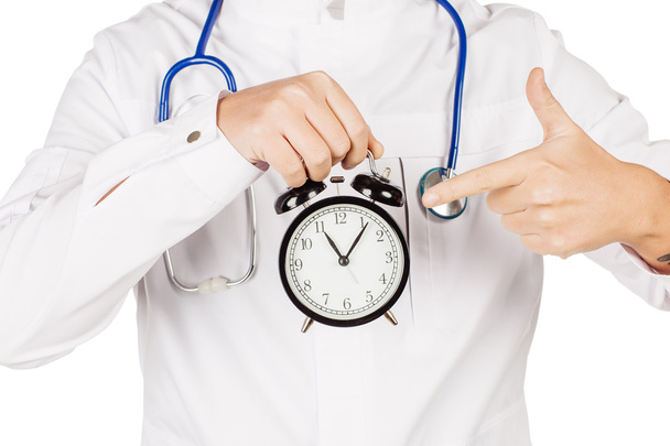 Medical doctor in white coat with stethoscope holding out an ala - Photo, image