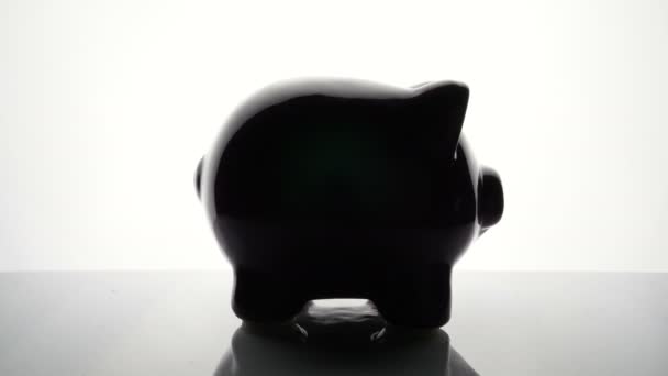 Piggy bank - back lit - Footage, Video