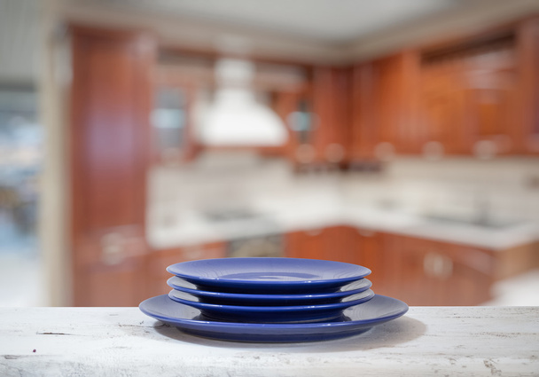 Blue plates on white table - Photo, Image