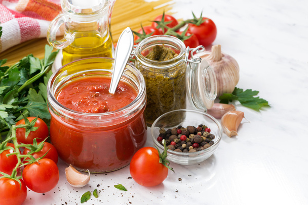 tomato sauce, pesto and ingredients for pasta - Valokuva, kuva