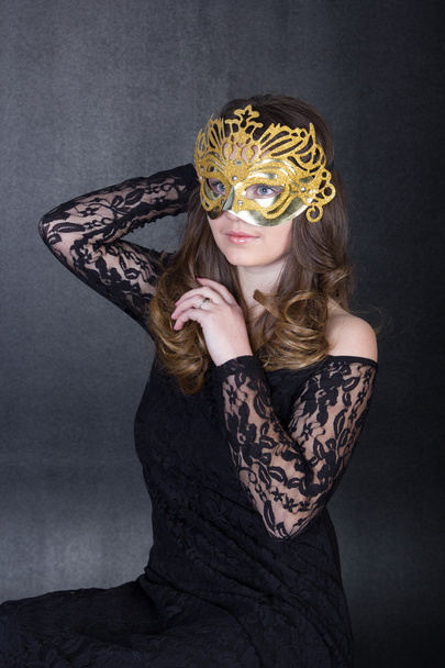 nice girl in mask and black dress - Foto, Imagem