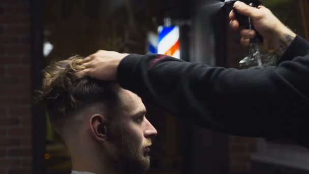 barber spraying customers hair before the haircut slow motion - Footage, Video