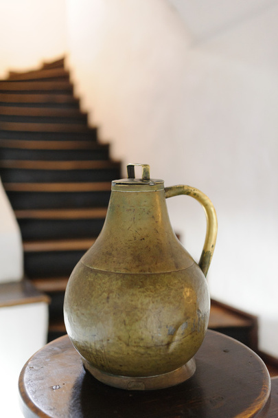 copper jug in historical museum castle Bran - 写真・画像