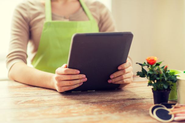 close up of woman or gardener holding tablet pc - Foto, Imagen