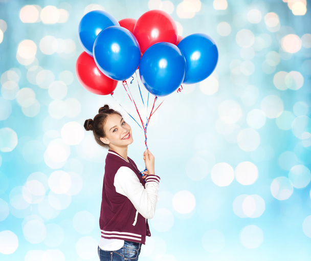 happy teenage girl with helium balloons - Fotoğraf, Görsel