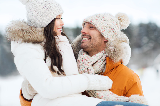 happy couple outdoors in winter - Foto, Imagem
