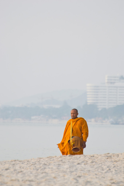 Monk on the beach - Фото, изображение