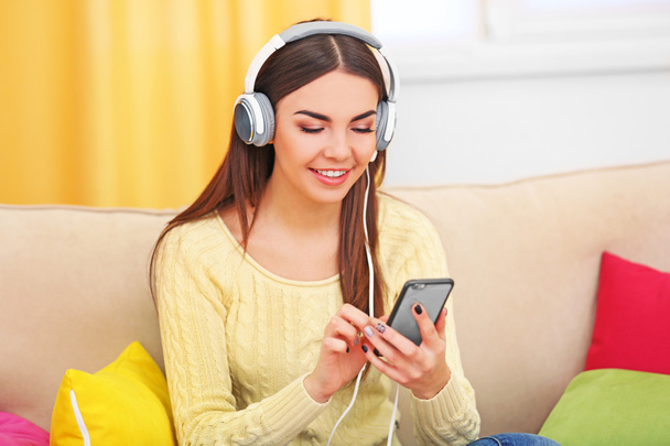 woman with headphones listening to music - 写真・画像