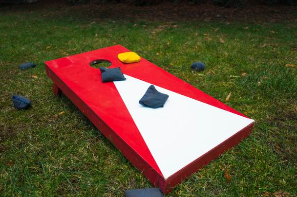 Cornhole Toss Game Board with Bean Bags - Photo, Image