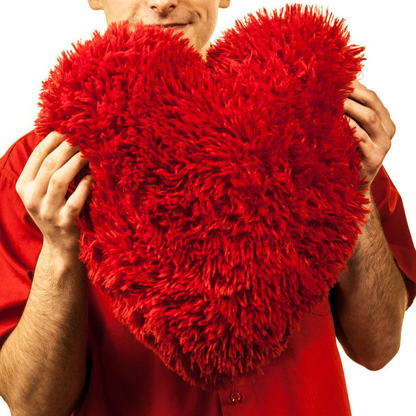Man holding red heart isolated - Фото, изображение