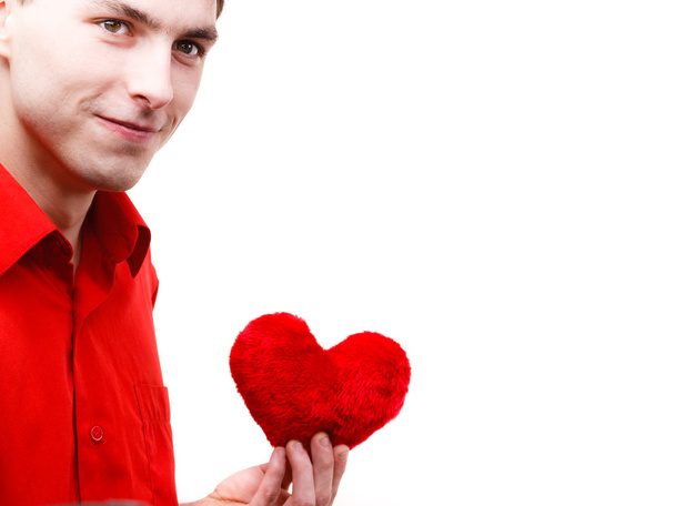 Man holding red heart isolated - Foto, Bild