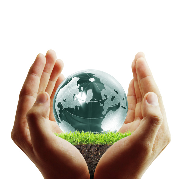Globe, emberi kéz, kezében az izzó Föld bolygó Föld - Fotó, kép