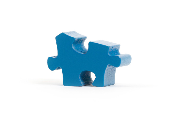 Closeup of big blue jigsaw puzzle piece - Photo, Image