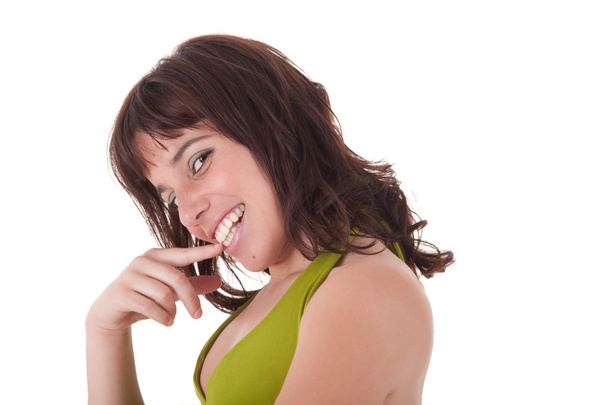 Красивая молодая женщина касается губ, изолированных на белом фоне. Снимок студии
 - Фото, изображение