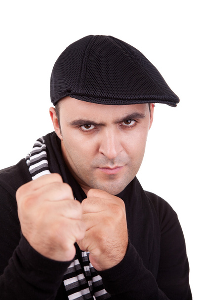 Angry man punching fist isolated on white, studio shot - Photo, Image