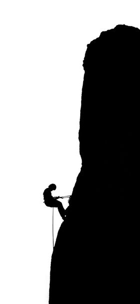 escalador en un acantilado
 - Foto, Imagen