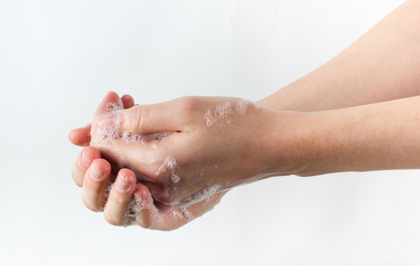 gesture of woman washing her hands on white background - Zdjęcie, obraz