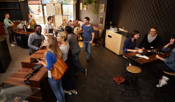 modern coffee shop with smiling customers - Zdjęcie, obraz