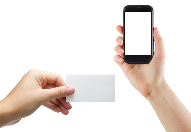weibliche Hände halten Mobiltelefon mit isoliertem Bildschirm und leere Visitenkarte isoliert auf weißem Hintergrund - Foto, Bild