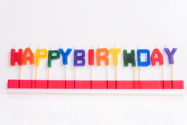 Happy birthday candle on white background - Foto, imagen