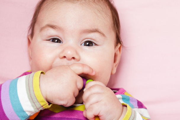 Baby are gnawing a toy - Photo, image