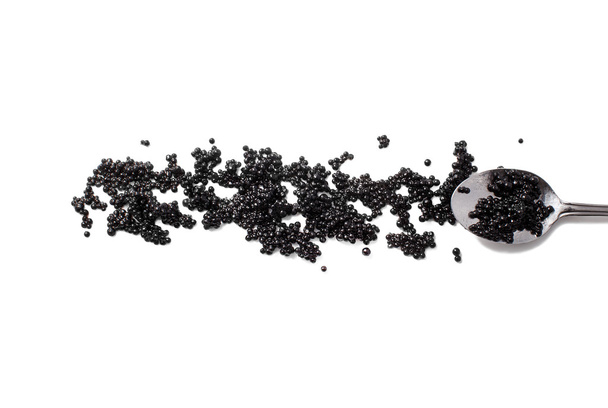 fekete kaviár és kanalat elszigetelt fehér background - Fotó, kép