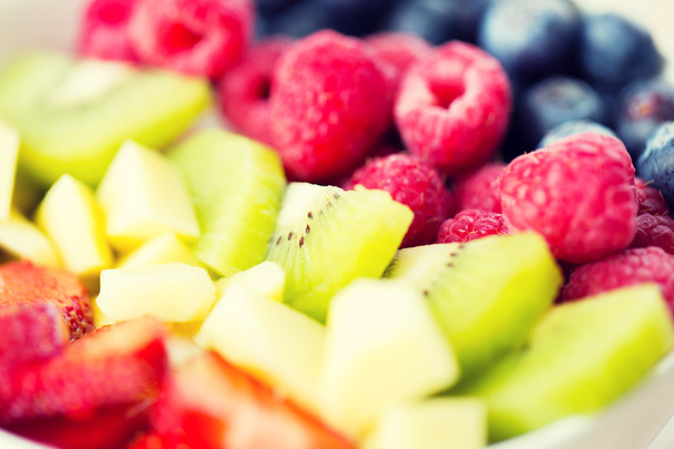 close up of fruits and berries in bowl - Photo, Image